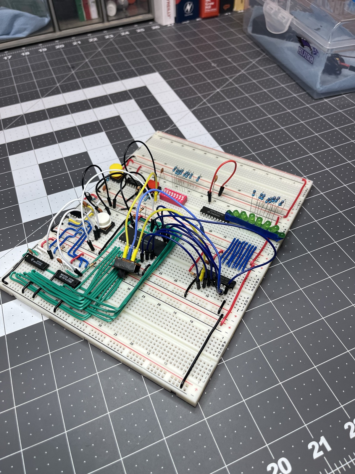 The v0.0.1 sequencer on one breadboard. 555 on the left, the two '590 counters and the MCM60256 SRAM in the middle, DIP switch and the LED bus on the right.