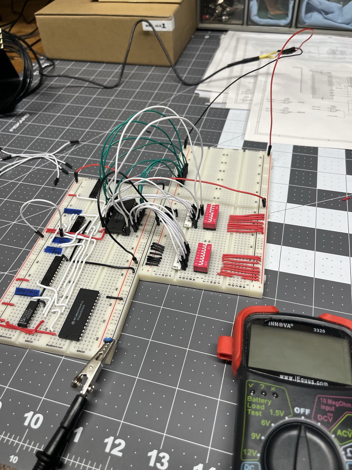 Reading the data bus pin by pin with the DMM. With the address held still on the switches there was nothing for the LA to add.
