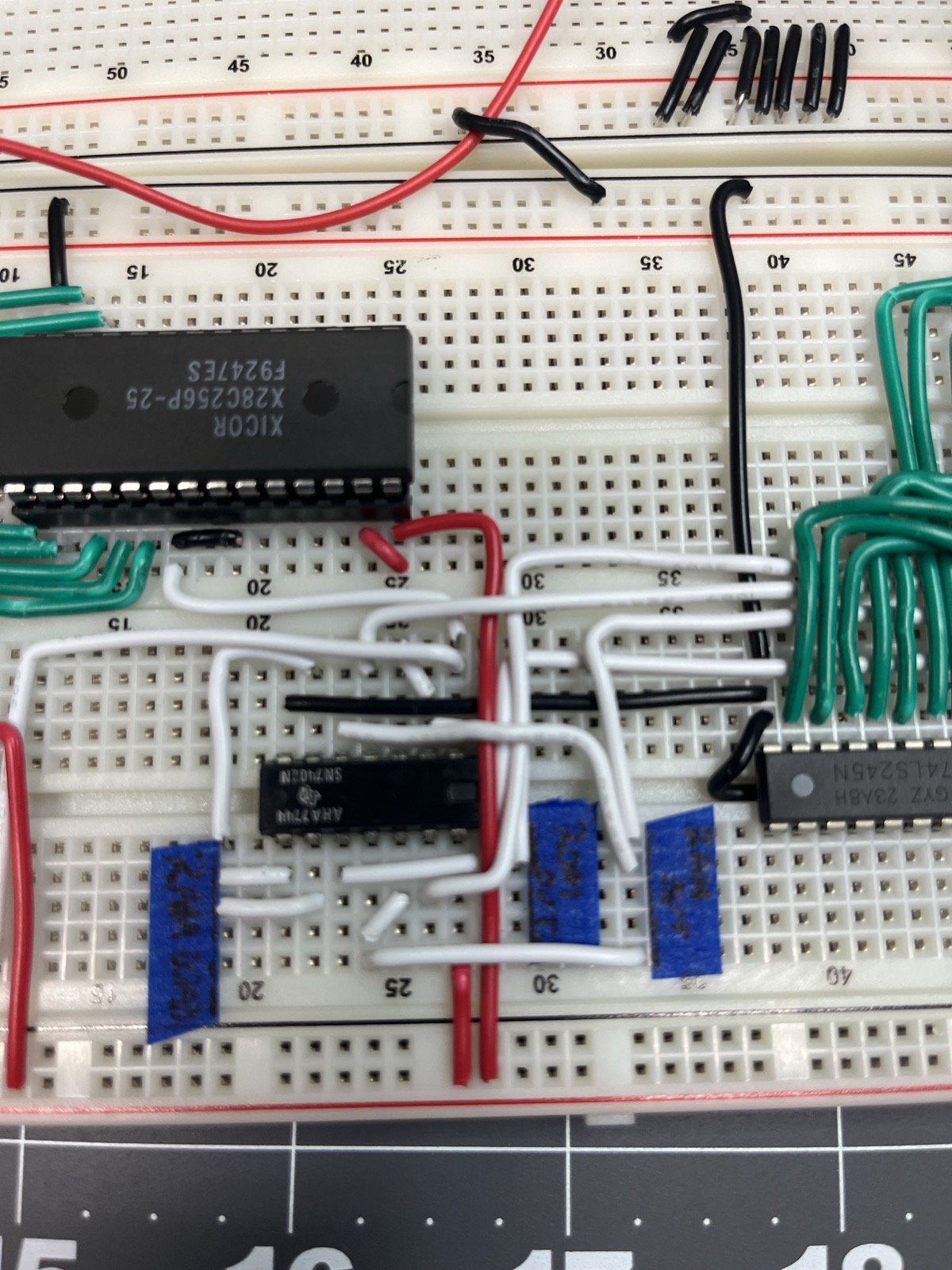 Close up: the ROM in the socket is a Xicor X28C256P-25, the '121 below it, and a '245 on the right.