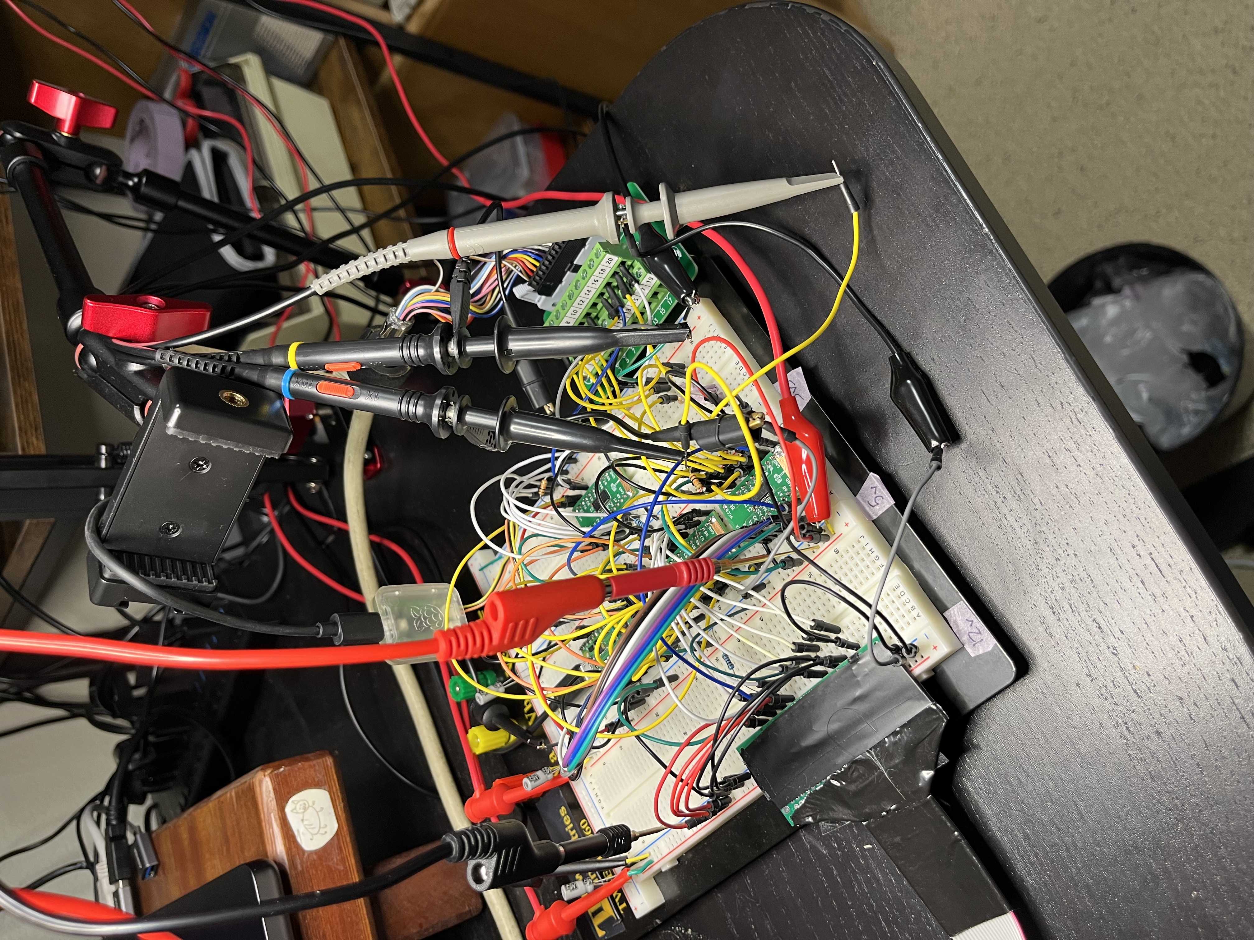 The rig during the WR captures: three scope probes on J1 for /WRREQ, WR and PH0, with the Liron cable coming into J1 at the back and the Pico 2 and shifter boards on the breadboard.