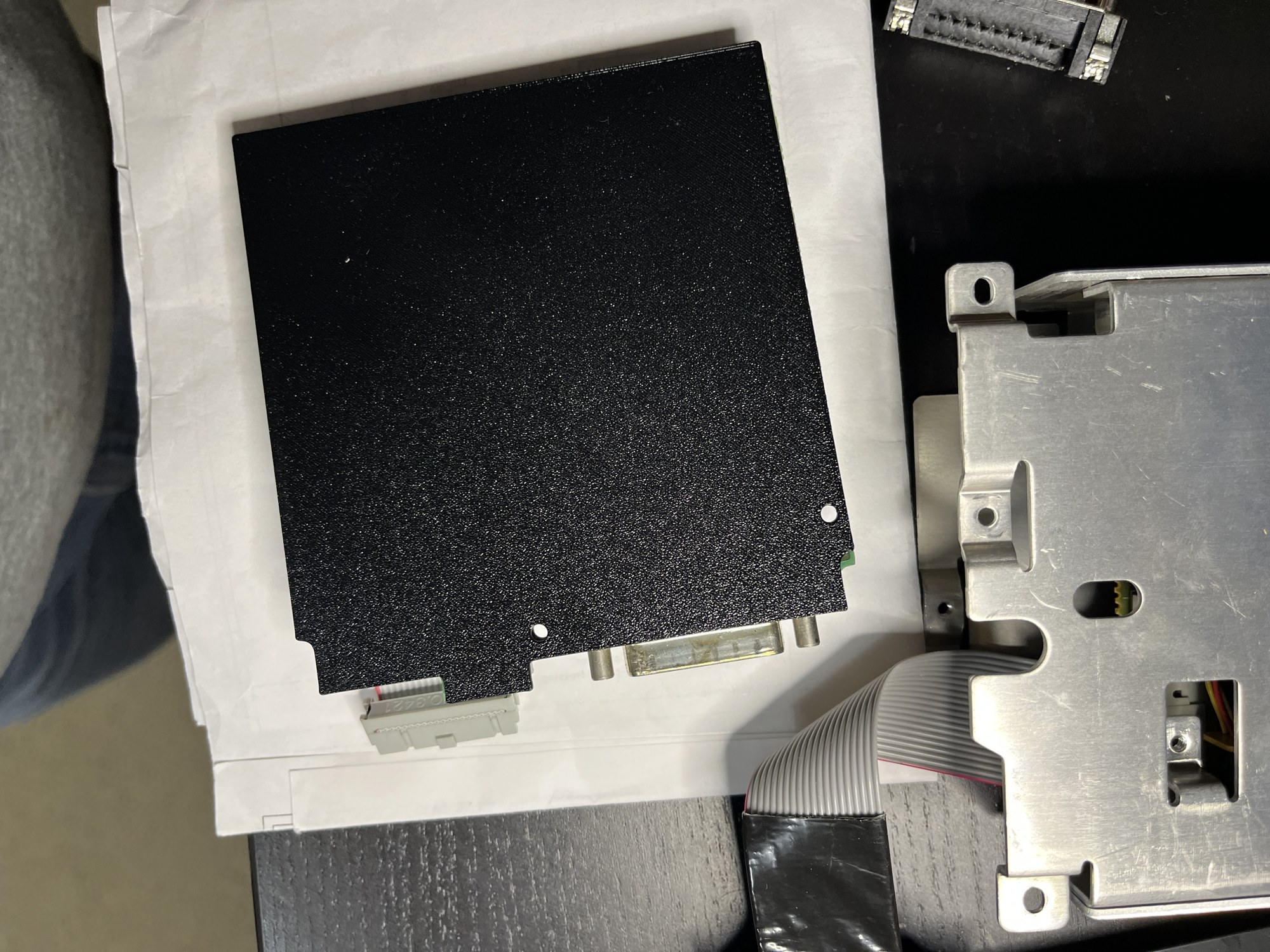 The final print stacked on the IF-83. White paper shows through both holes, so they line up.