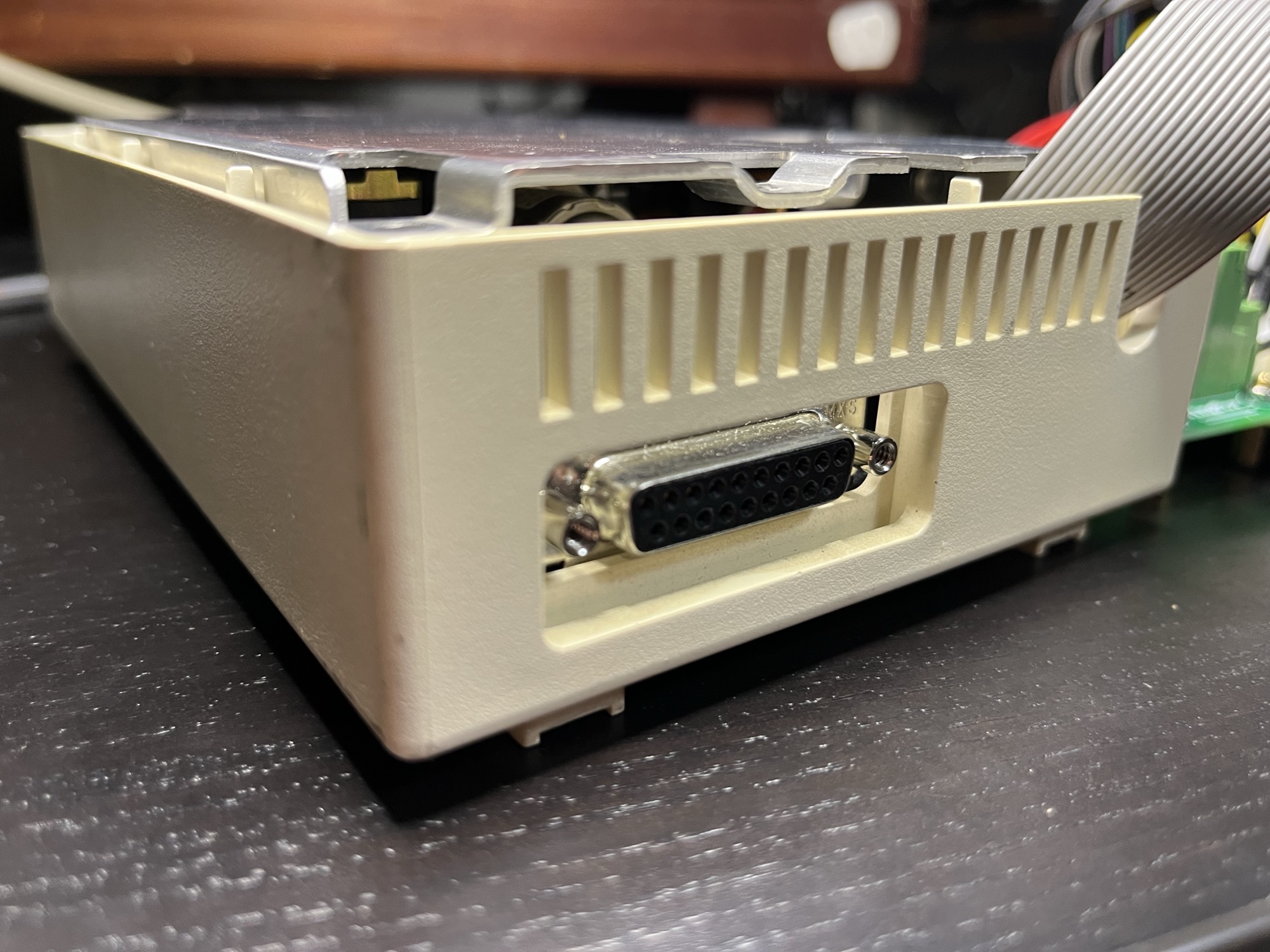 With the case on, the D-shell sits in the rear opening.