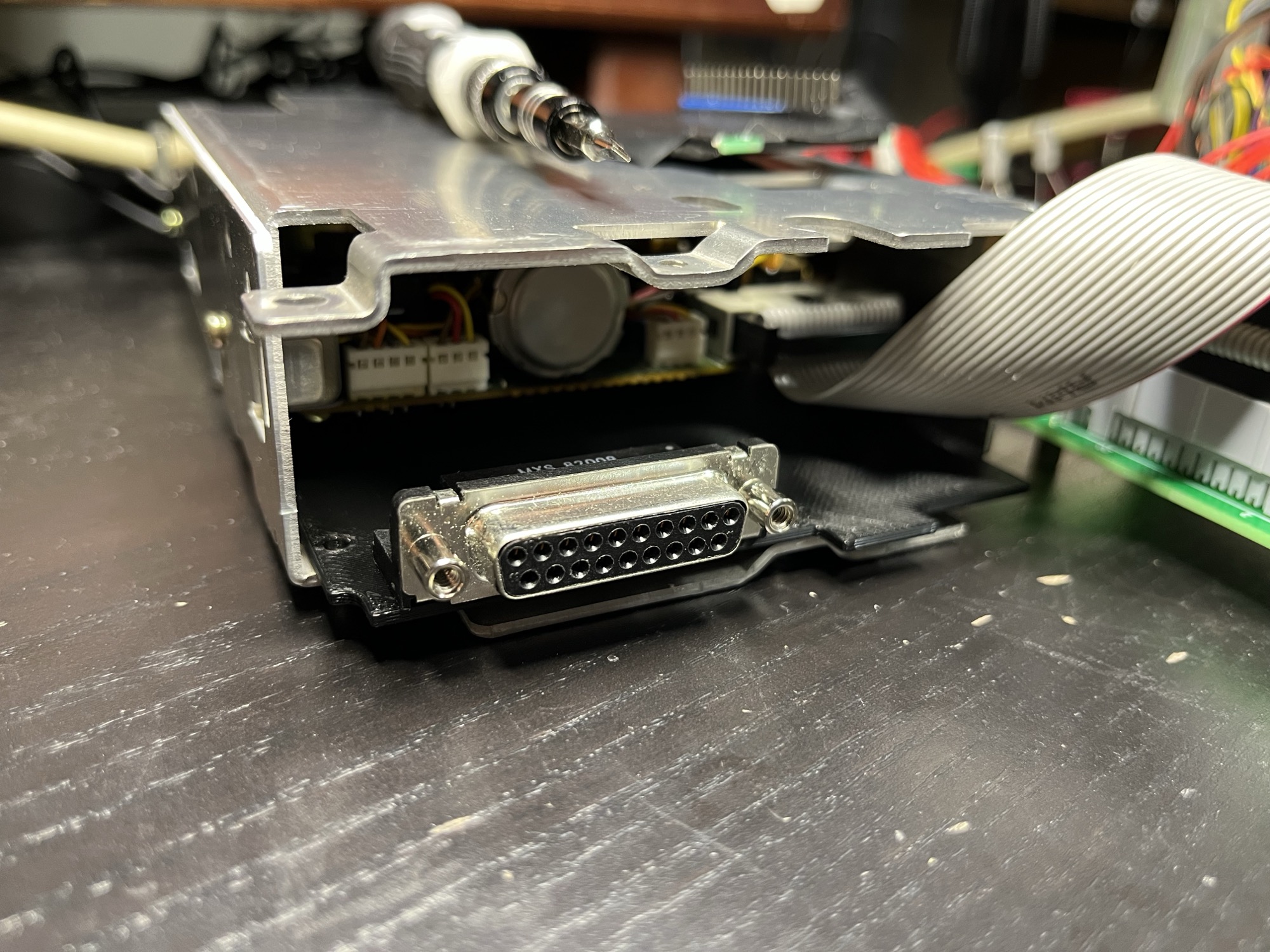 The print with the DB-19 mounted, in the chassis under the mechanism. It fits.